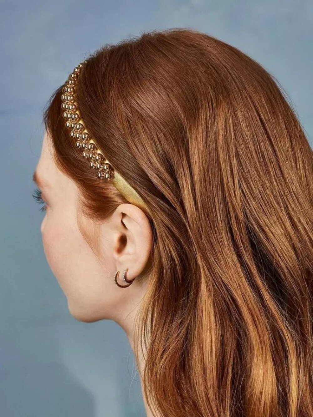 Bubble Bar Beaded headband in gold tone.
